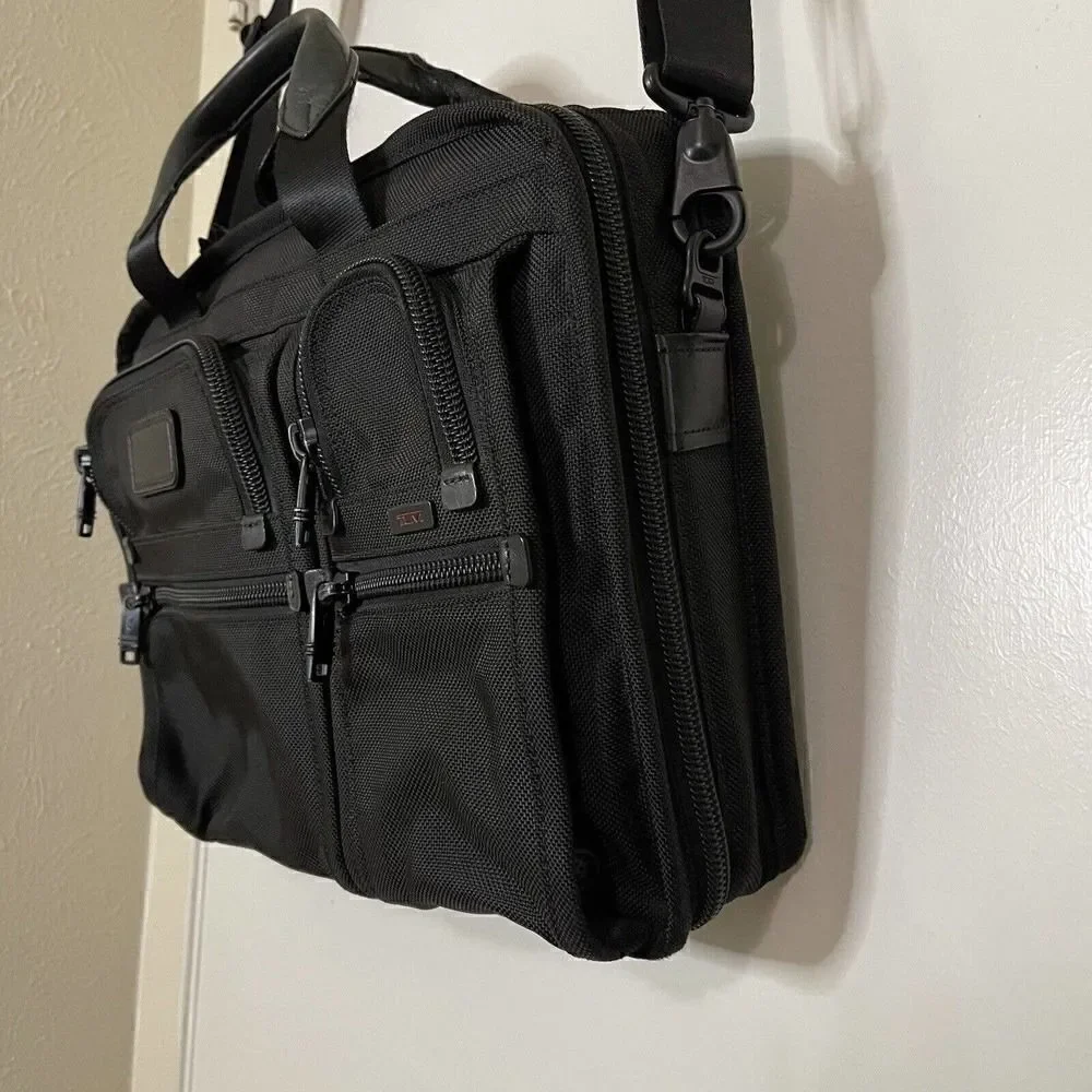 TUMI Alpha Expandable Black Nylon messenger travel laptop carryon bag with strap
